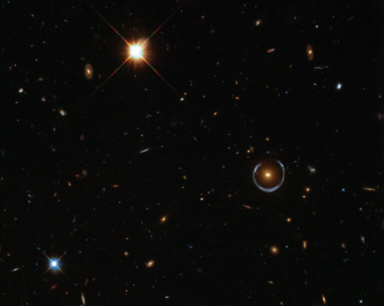 A Horseshoe Einstein Ring from Hubble