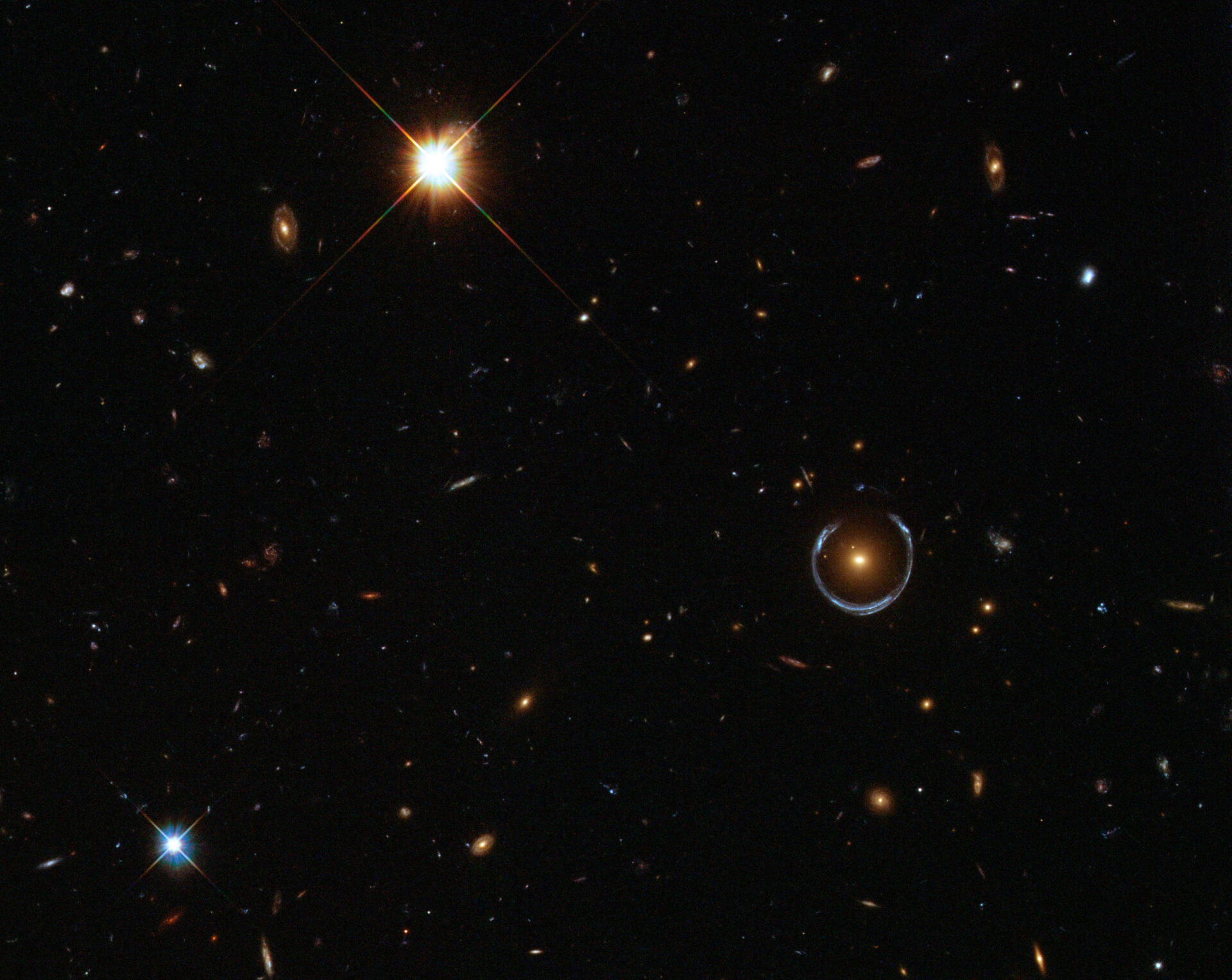 A Horseshoe Einstein Ring from Hubble