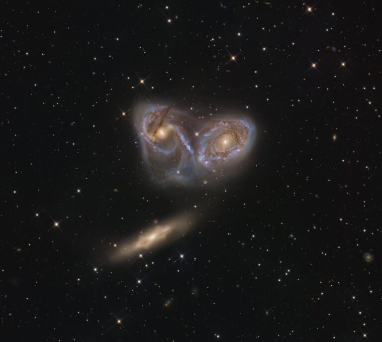 Three Galaxies in Pavo