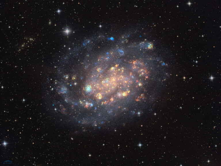 NGC 300: A Cosmic Gemstone with Stars and Gas Clouds